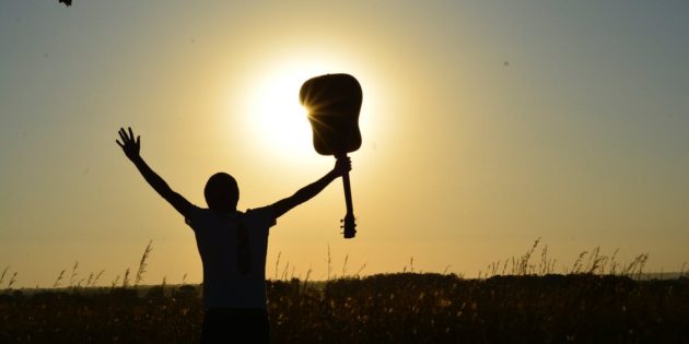 Man holding guitar